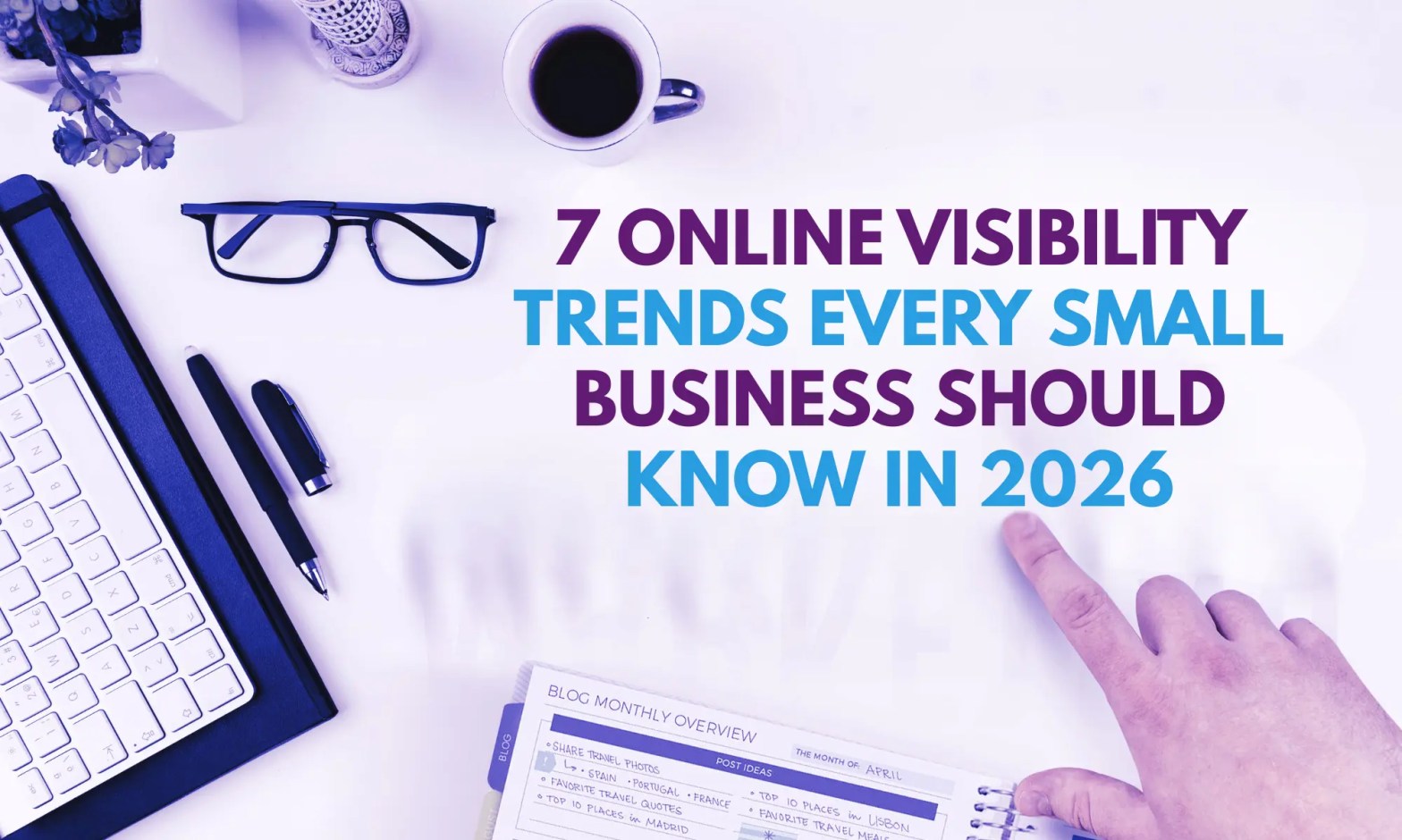 Flat lay of a desktop workspace with keyboard, planner, glasses, pen, and coffee, styled to accompany the blog post titled 'Online Visibility Trends for Small Businesses in 2026'